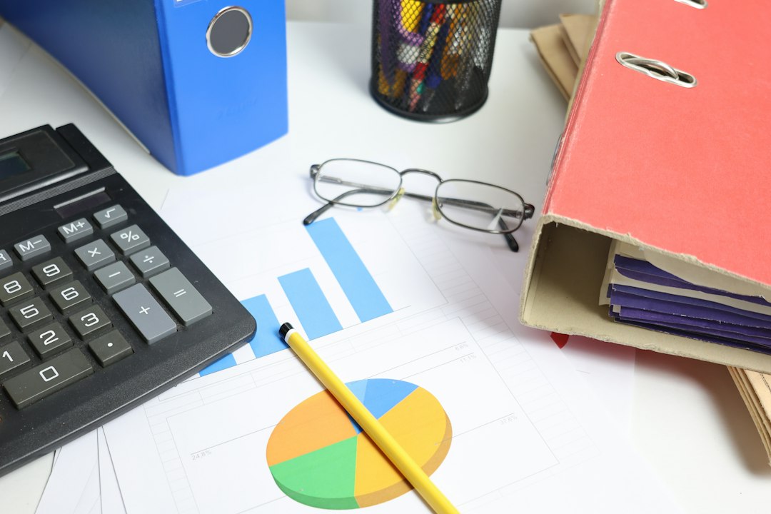 Desk Calculator with Charts and Binders Desk with calculator, charts, and binders